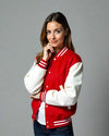 Woman wearing a red and white varsity jacket